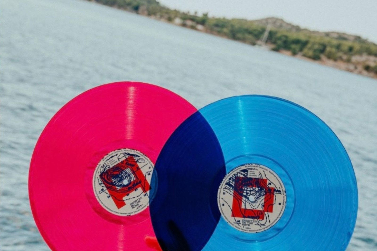 The pink and blue pressings held over the sea &mdash; Croatia on the Move, Cycle Studio Zagreb